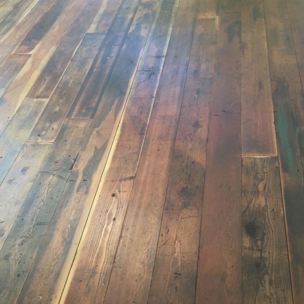 Close view of dark stained hardwood planks