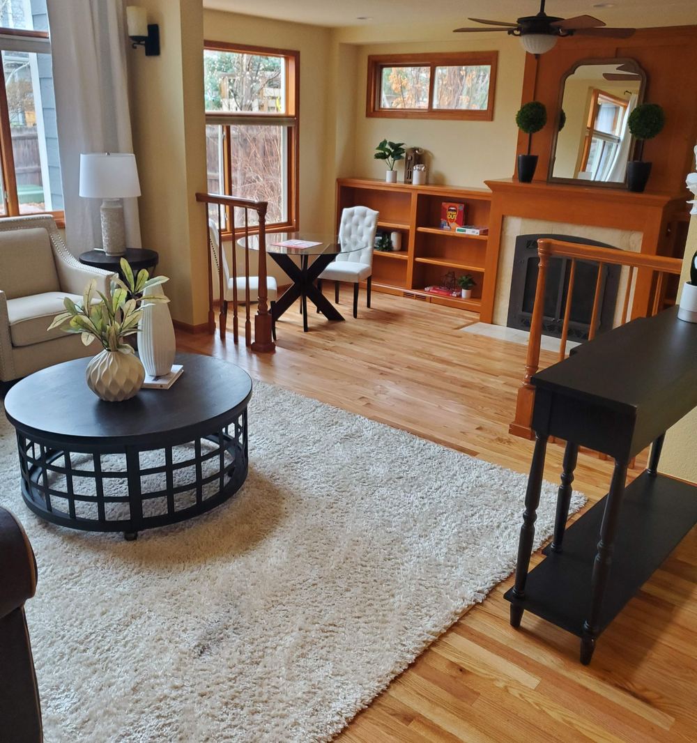 Living room with a refinished light hardwood floor
