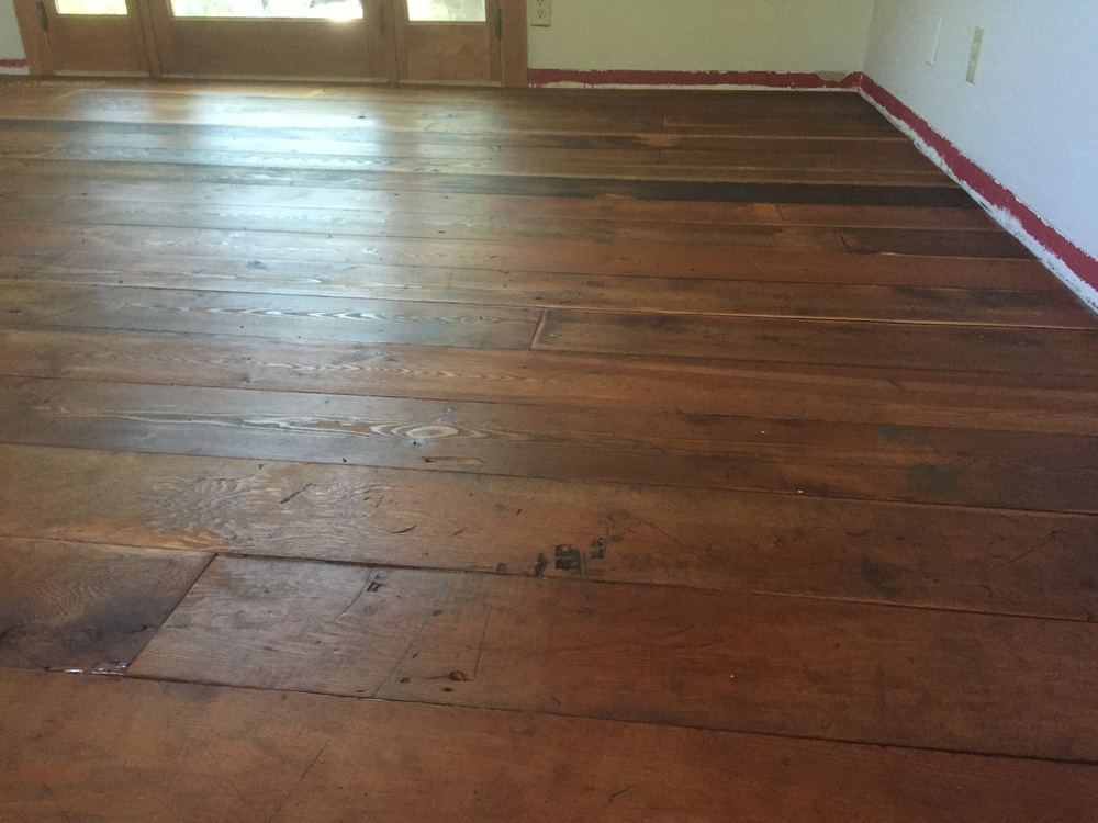 Wide-plank hardwood floor with a dark finish